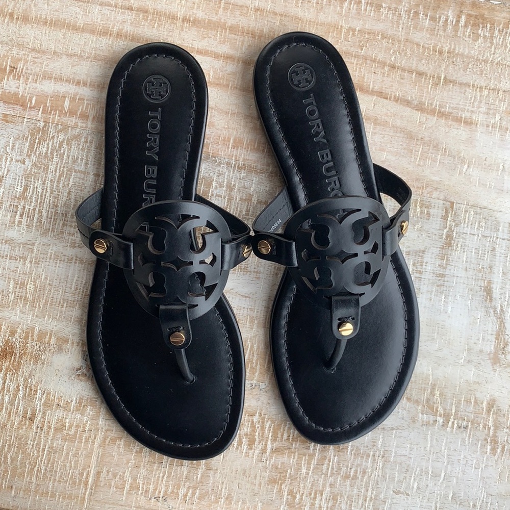 New never worn. Black leather sandal